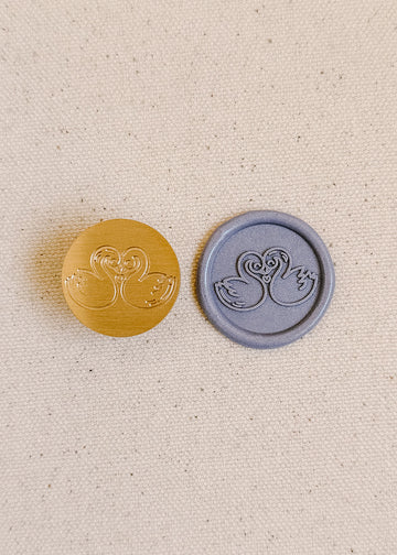 Swans in Love wax stamp (imperfect)