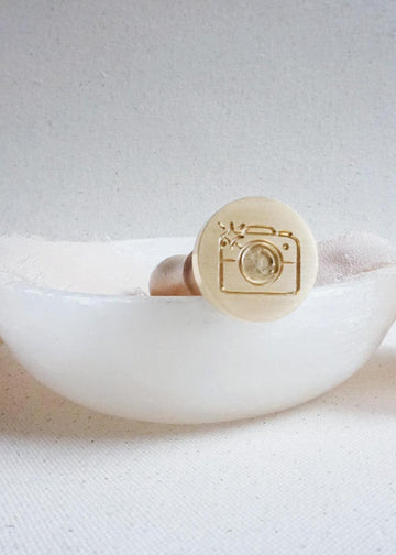 Camera wax stamp