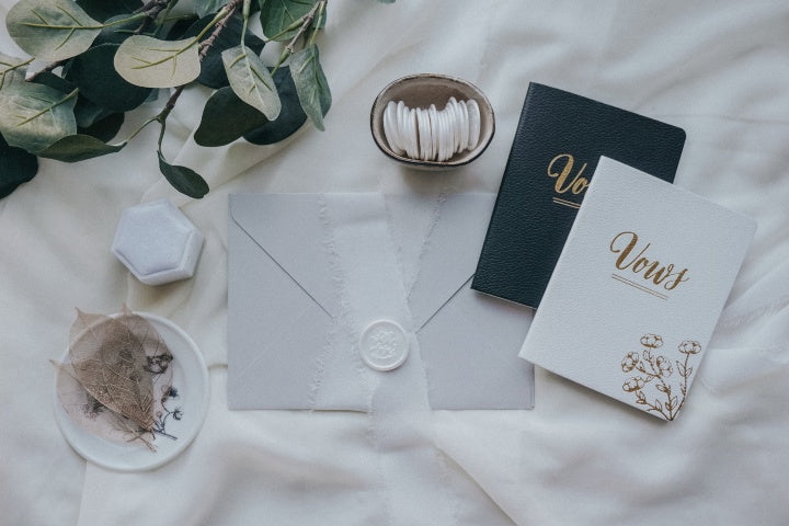 with_love-wax_seal-Dove_white-wax_seals_in_bowl-envelope-wedding_items_and_botanical_flatlay-background_2 - Made of Honour Co.